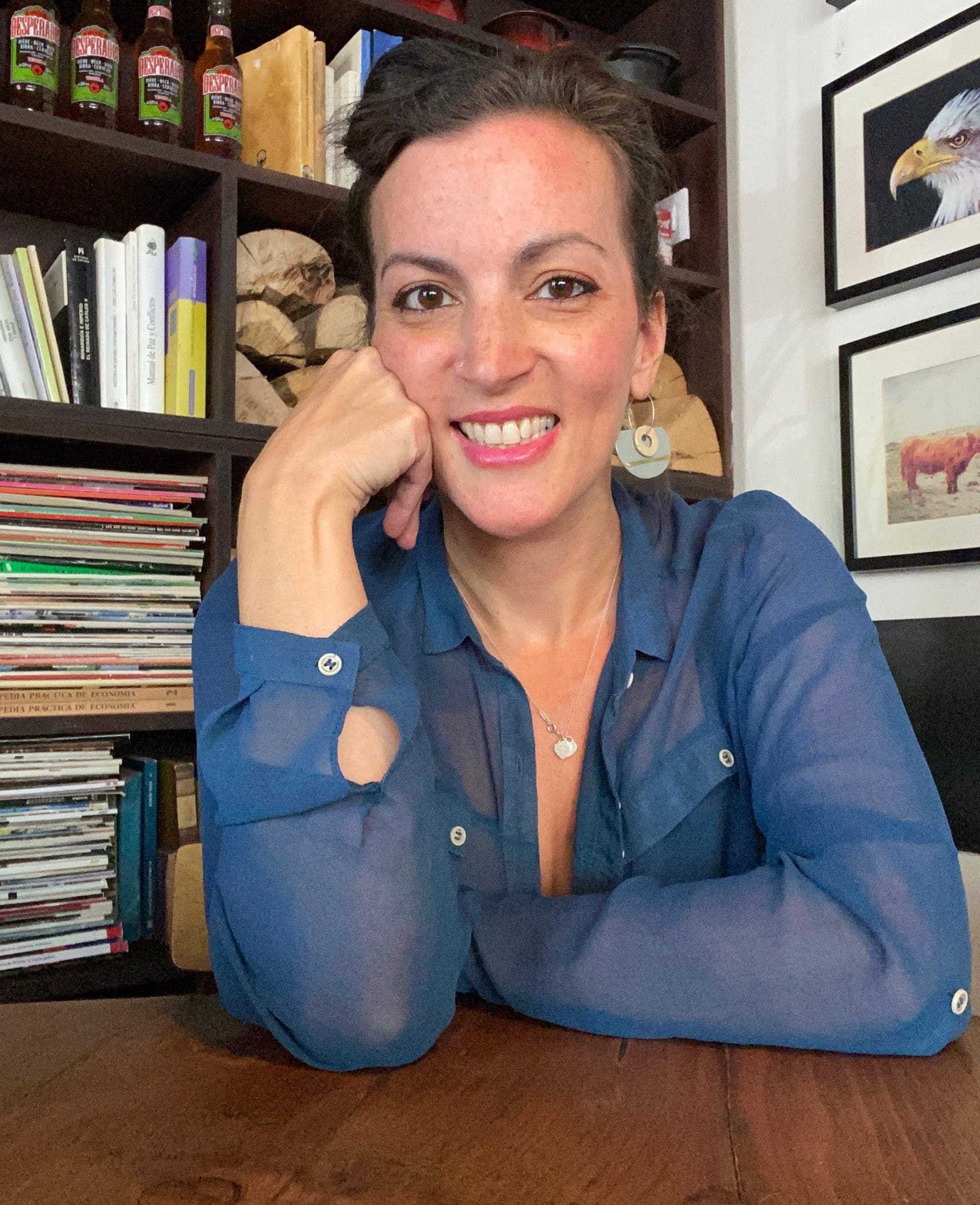 Stephanie, a young woman with EGFR lung cancer from Spain, smiles in a close up photo.