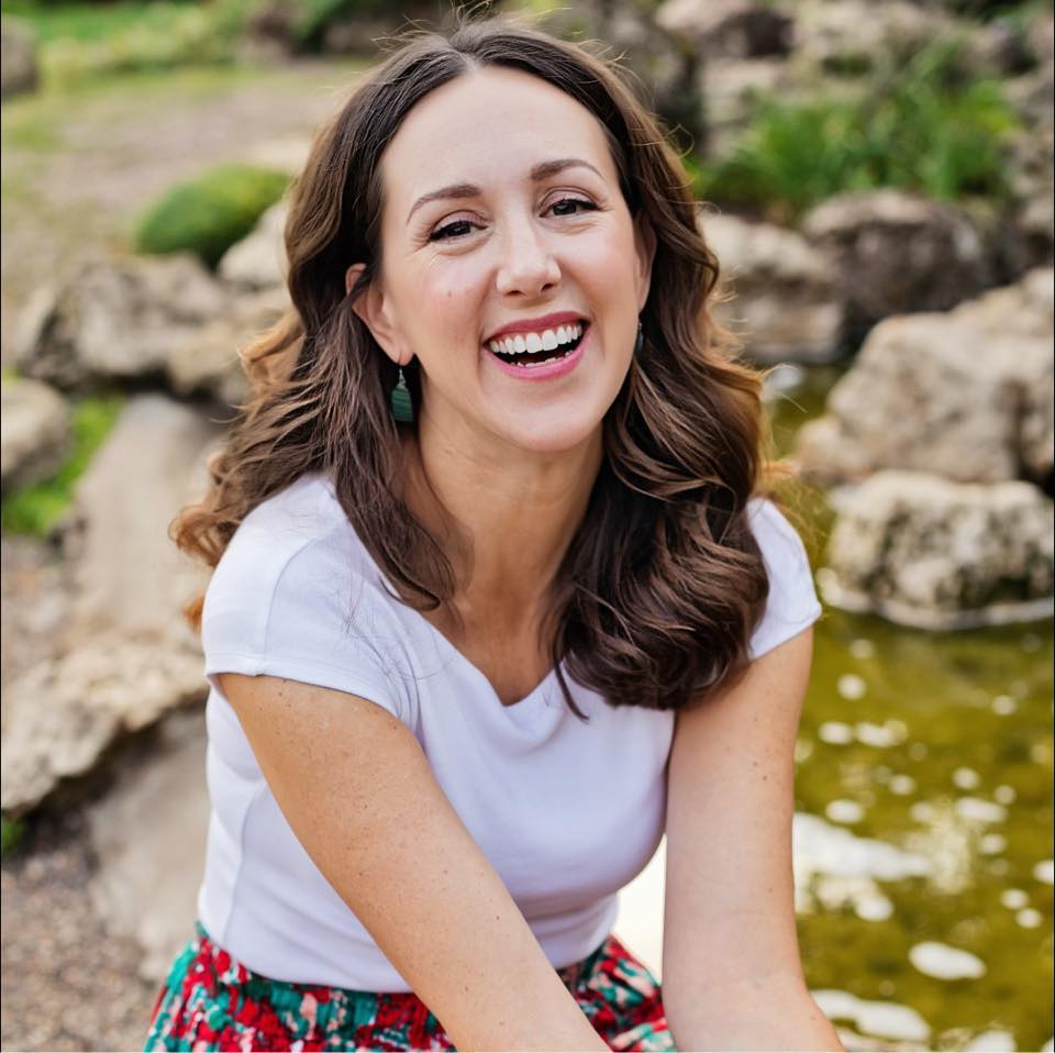Teri Fischer was diagnosed with EGFR NSCLC. She lives in Minnesota with her husband and three children. She is sitting outside in a white shirt smiling.
