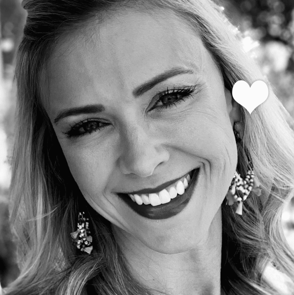 Tiffany Job, a young woman from Texas with lung cancer smiles in a black and white photo. In loving memory.