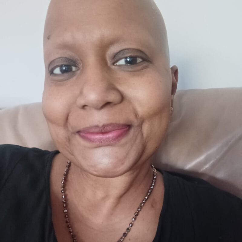 Tamara, a lung cancer patient from South Africa, smiles