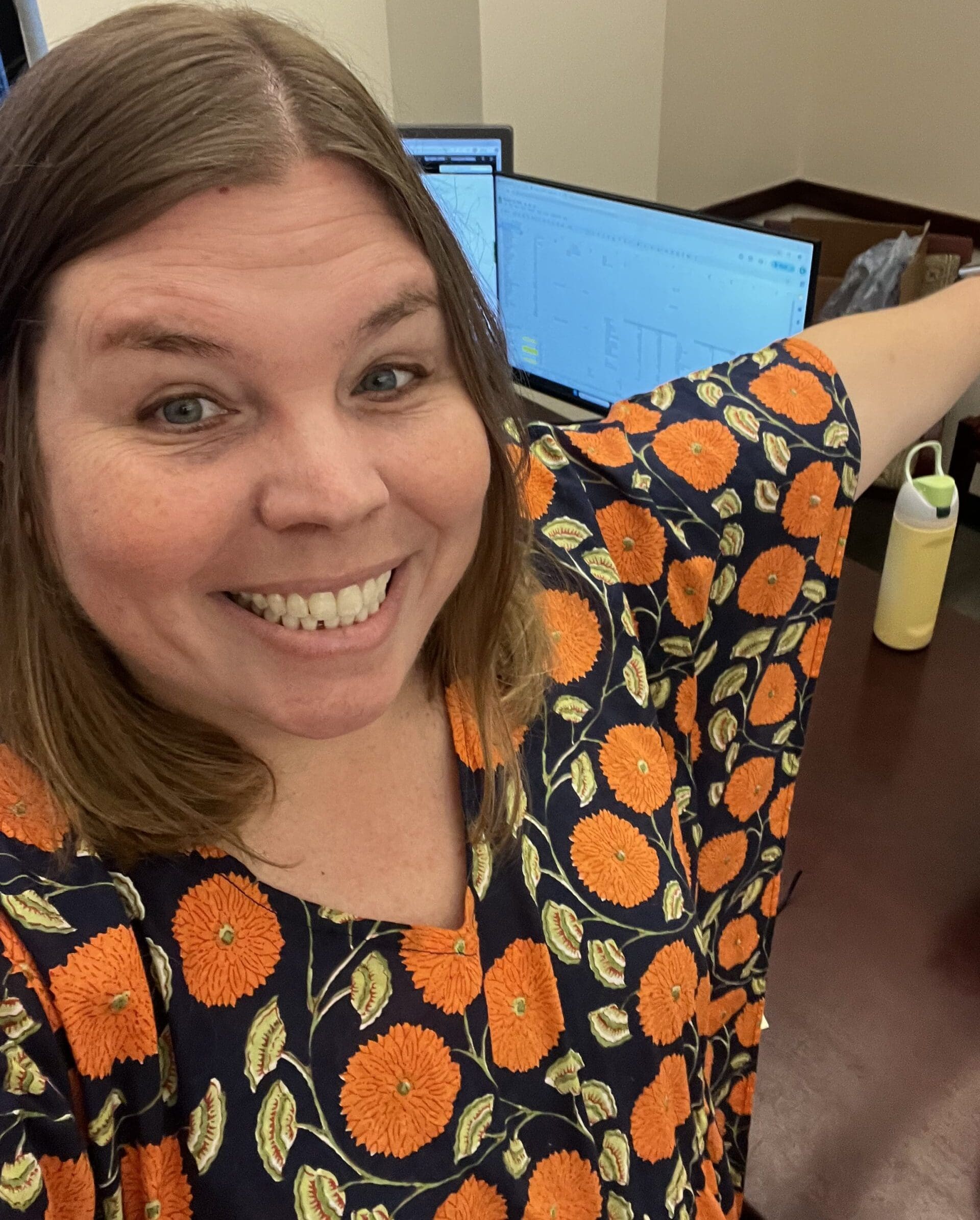 Rebecca Diagnosed with lung cancer at 45 from Tennessee smiling in floral shirt