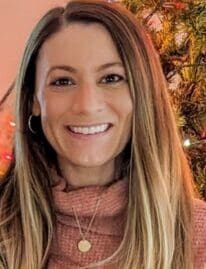 Amy, a young woman with lung cancer from Massachusetts, smiling.