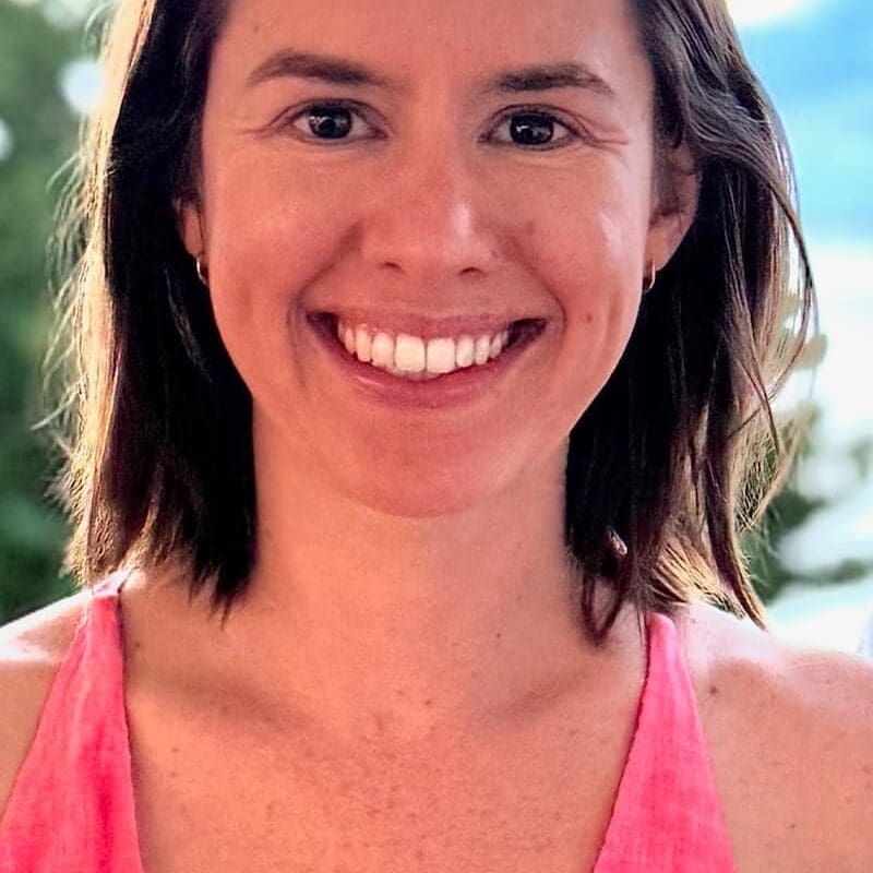 A young woman with lung cancer smiling