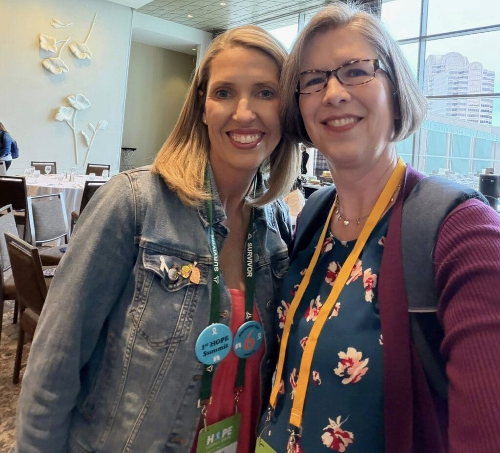 Dr. Amy Moore smiling with lung cancer patient advocate Leah Phillips at the HOPE Summit.