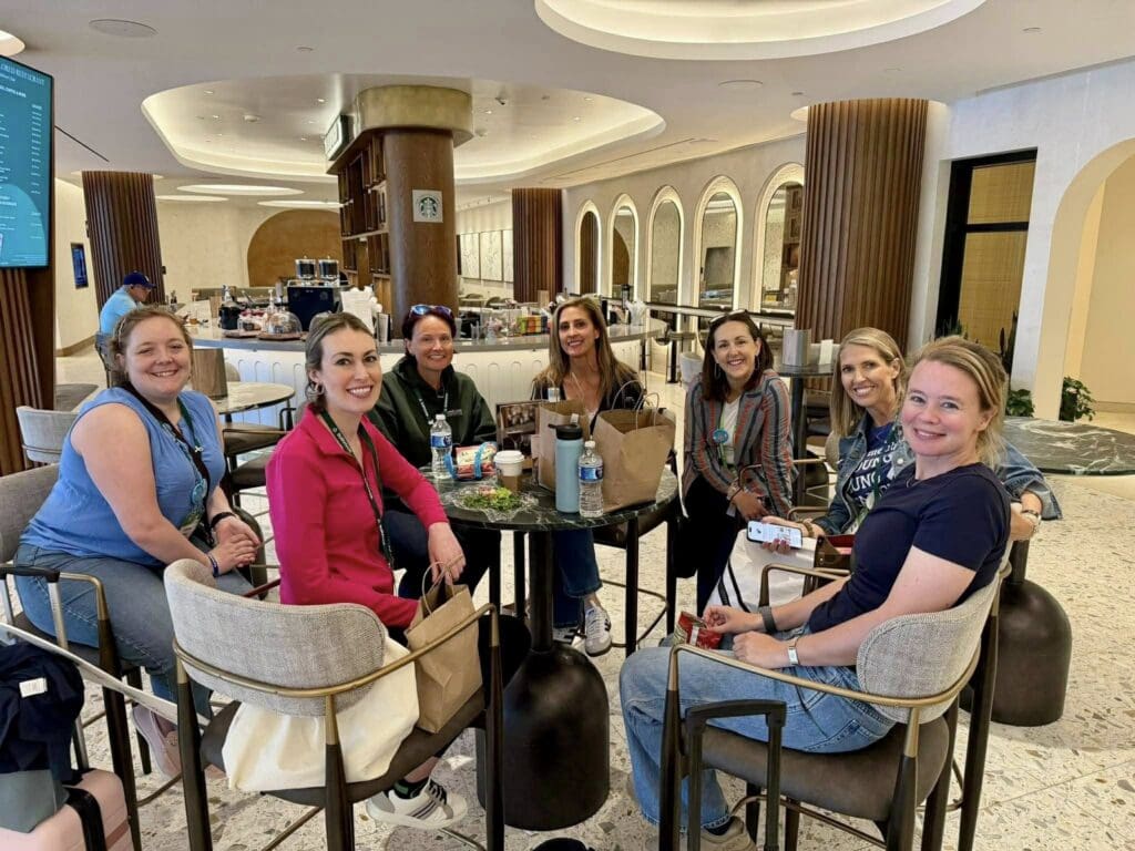 Young lung cancer community members gathered at a table during a YLCI meet-up at the LUNGevity summit