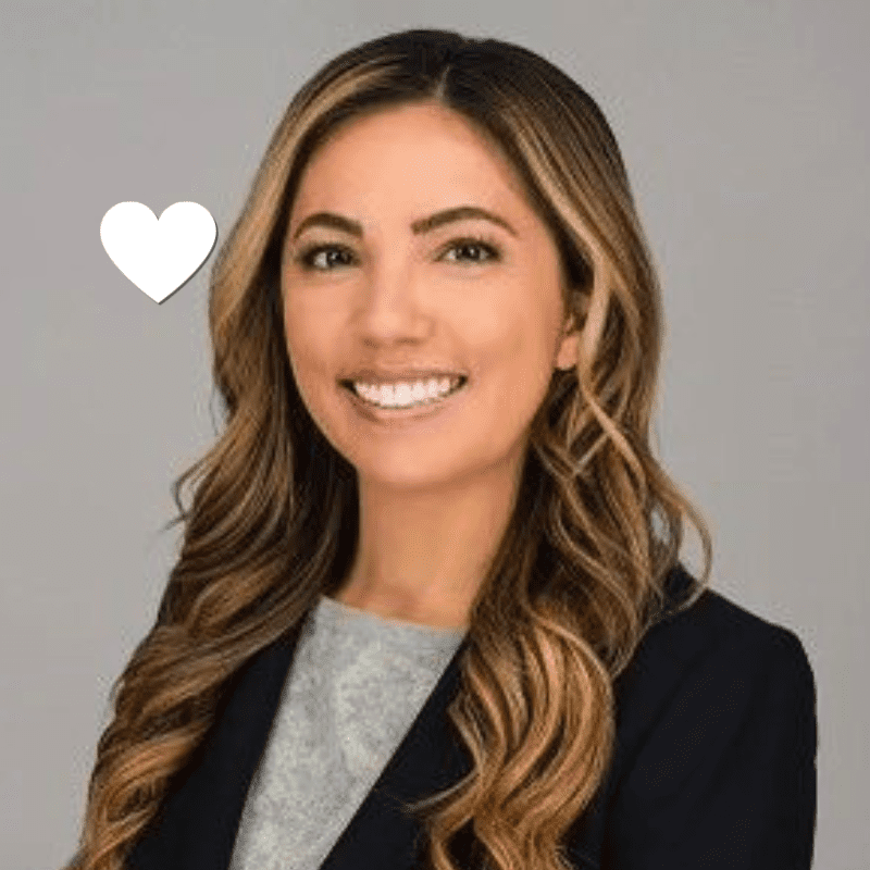 Denise, a young lung cancer patient, smiling in a professional headshot.