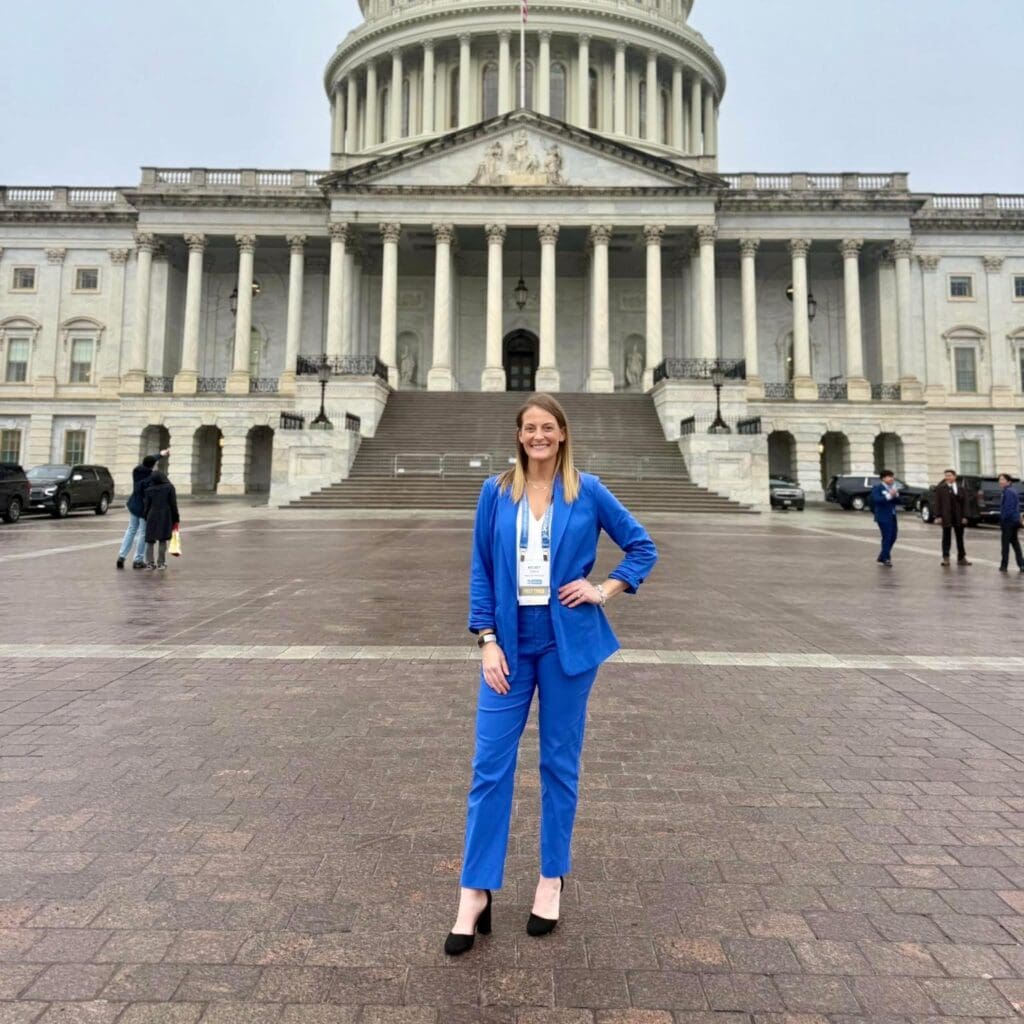 Lung cancer patient and advocate Kelsey Dellino advocating for research funding outside the U.S. Capitol in Washington, DC