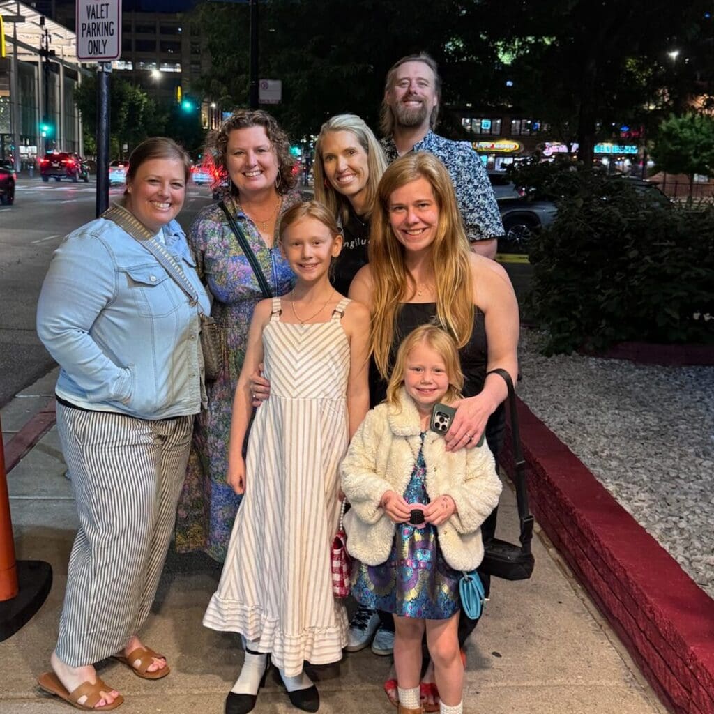 Young lung cancer community members posing outdoors at ASCO 2026