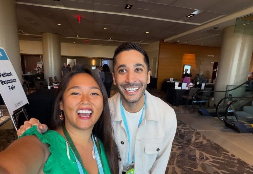 Patient advocate Aurora Lucas smiles with thoracic oncologist Dr Eric Singhi at lungevity hope summit Dallas