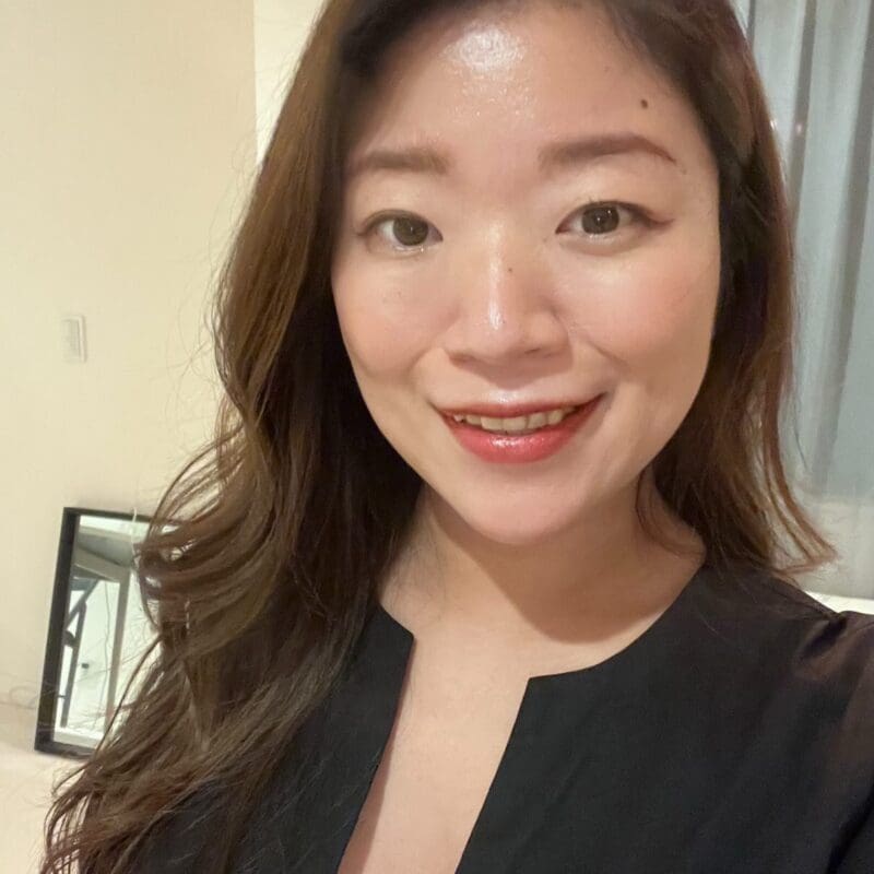 young lung cancer patient AI from Japan smiles in a selfie