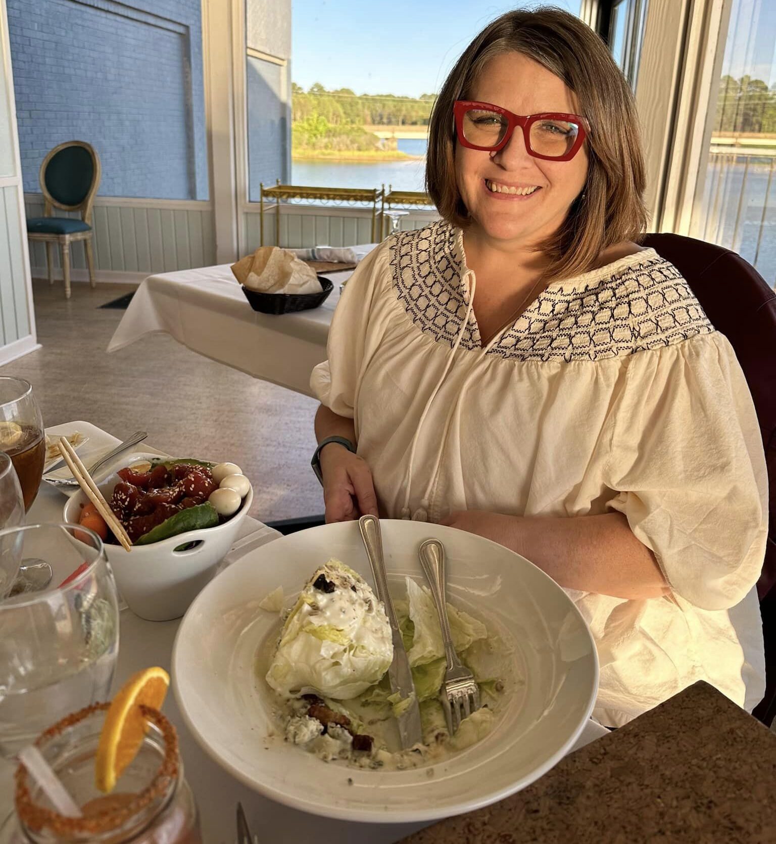 Young lung cancer patient smiling at dinner